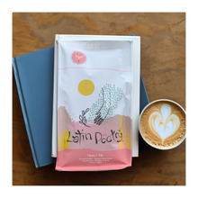 Load image into Gallery viewer, Discover the Rich and Smooth Flavor of Our Latin Poetry Medium Roast Coffee, Featuring Dominican Peaberry - AtilanoCoffee.Com 

